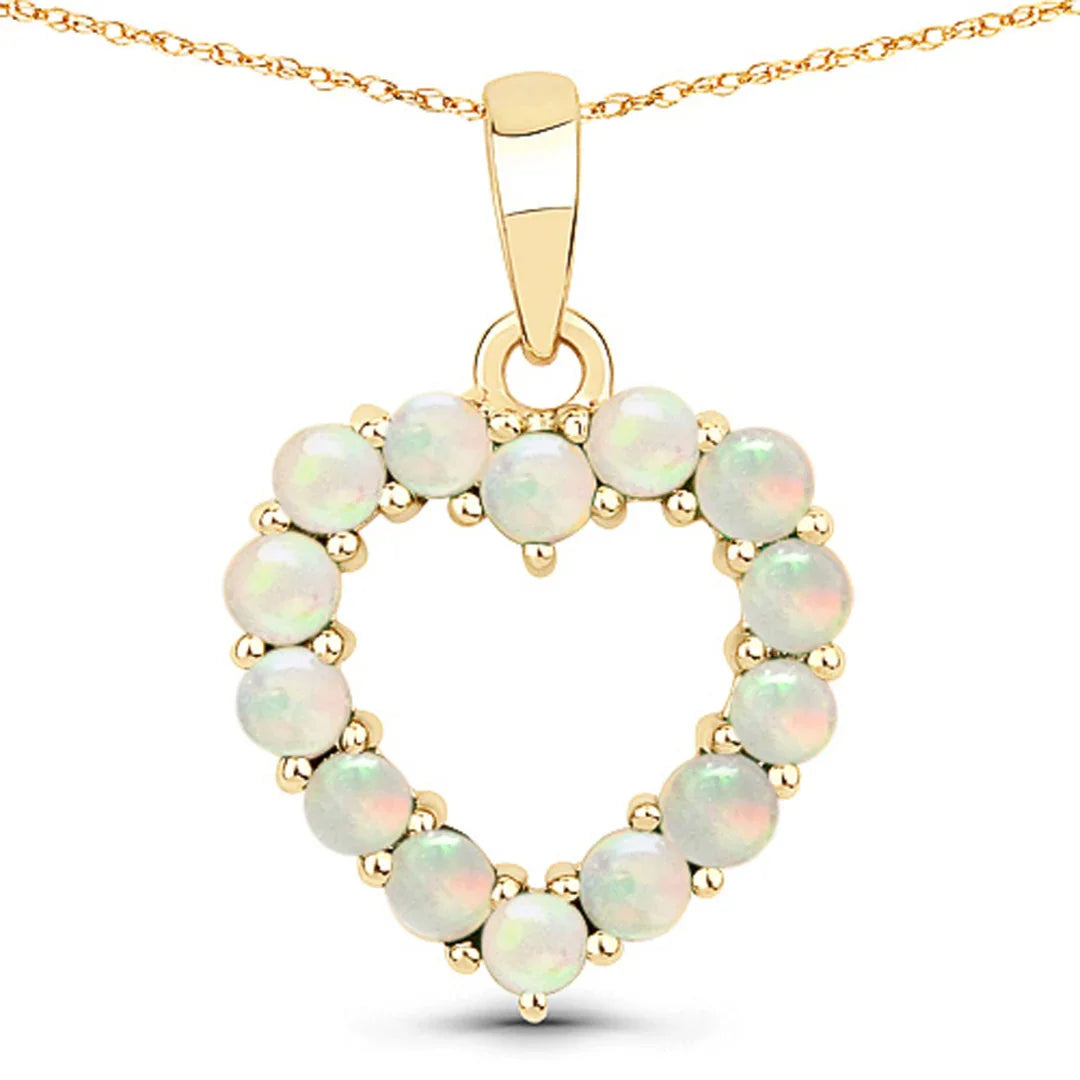 Collar con corazón de rubí en oro amarillo de 10 quilates