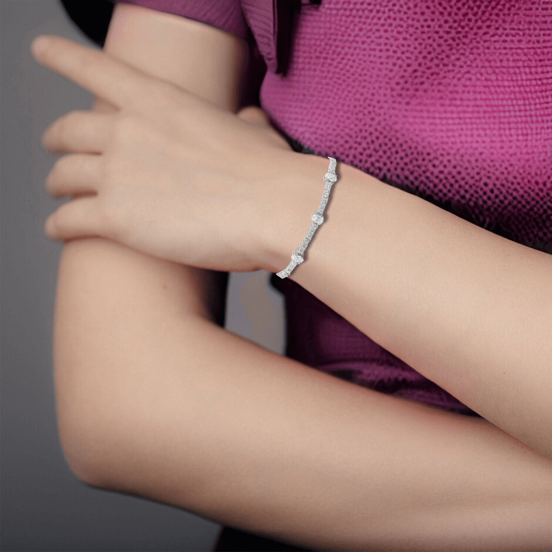 Elegant model hand showcasing the intricate details of our Natural White Zircon Bracelet Sterling Silver Dainty Bracelet