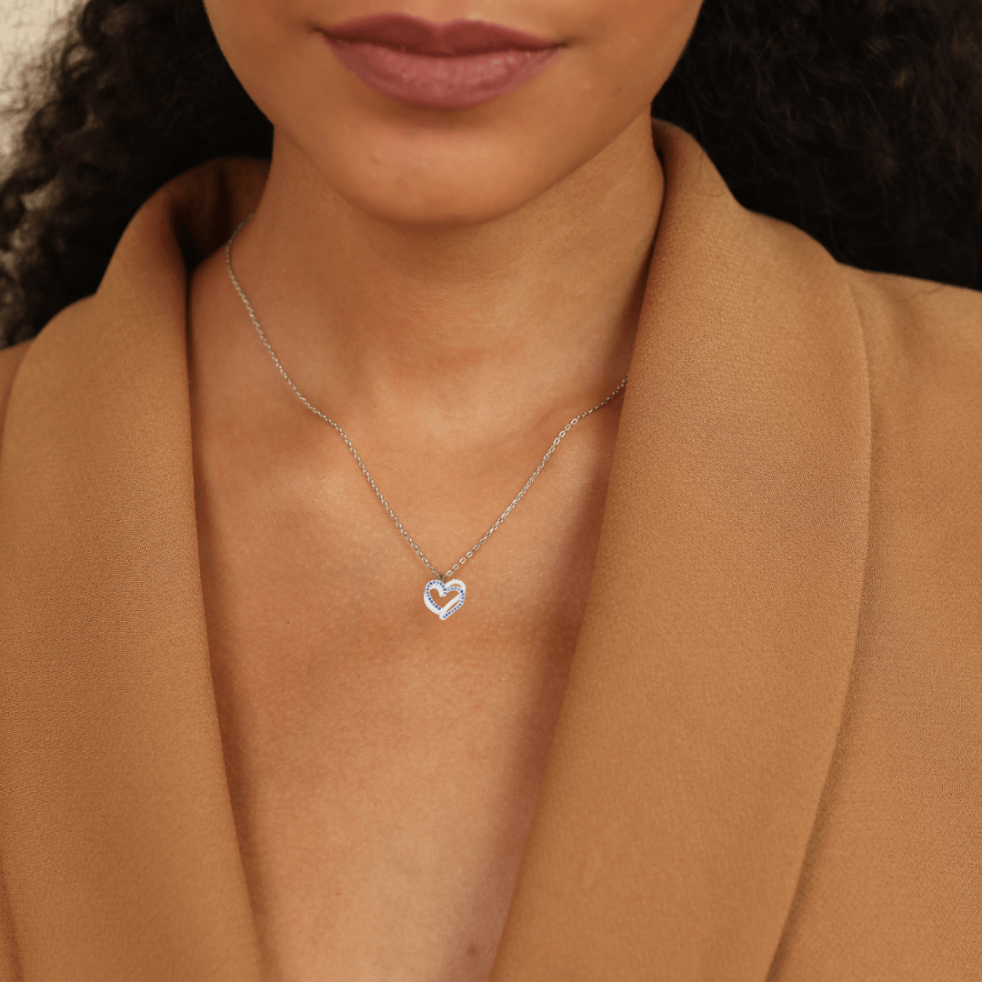 model showcasing Genuine Blue Sapphire Heart Pendant Necklace