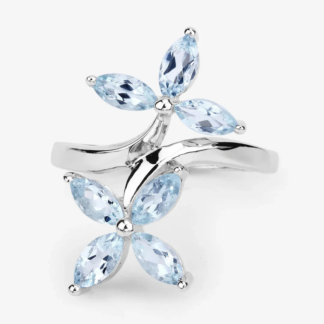 Anillo bypass con flor de aguamarina
