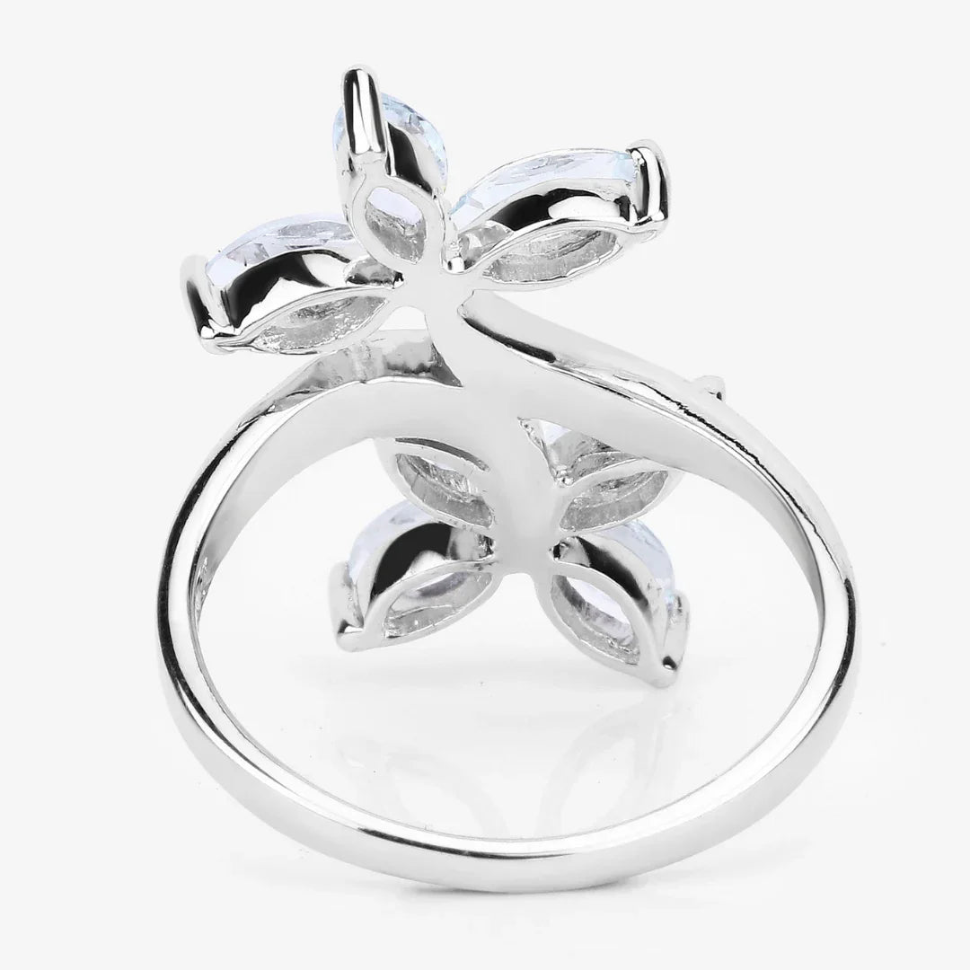 Anillo bypass con flor de aguamarina