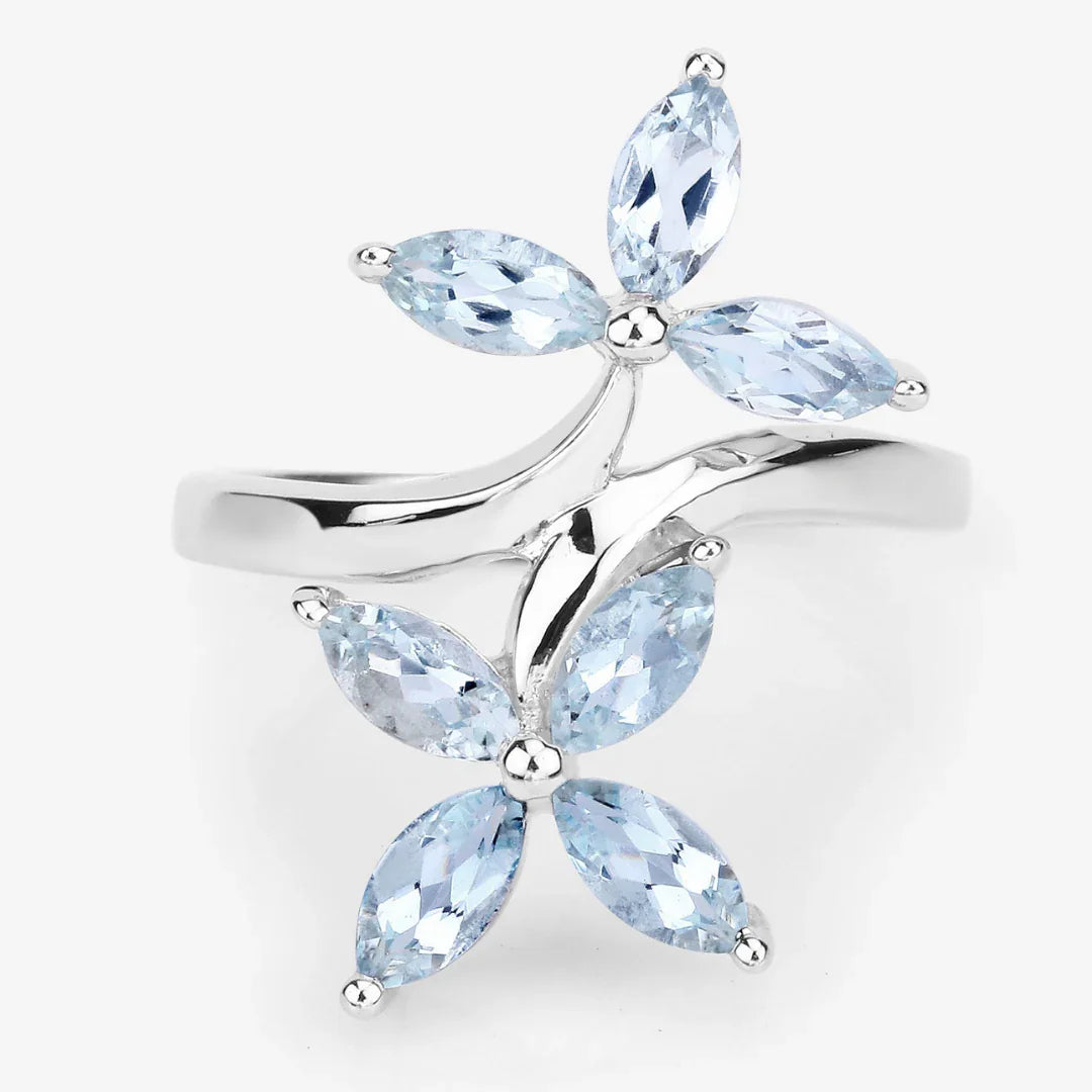 Anillo bypass con flor de aguamarina