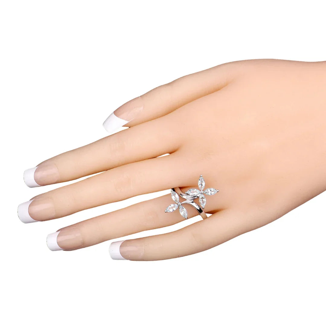Anillo bypass con flor de aguamarina