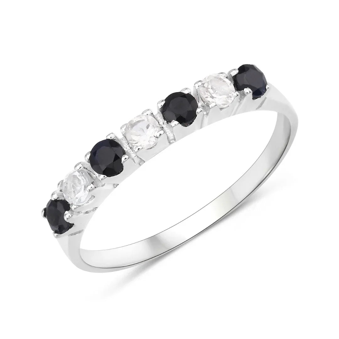 Anillo de media eternidad con zafiro negro y topacio blanco