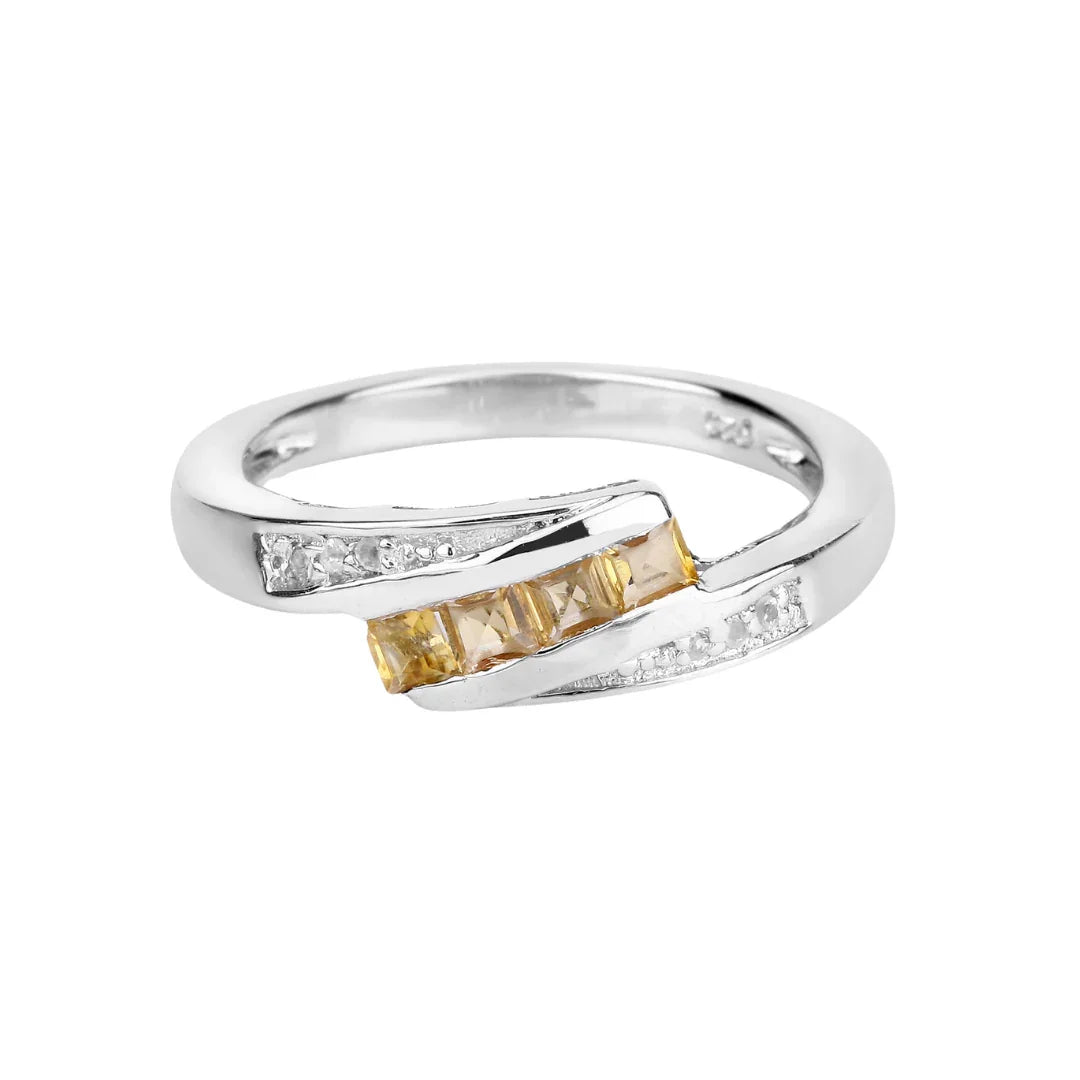 Anillo de plata de ley con circonitas blancas y berilo amarillo
