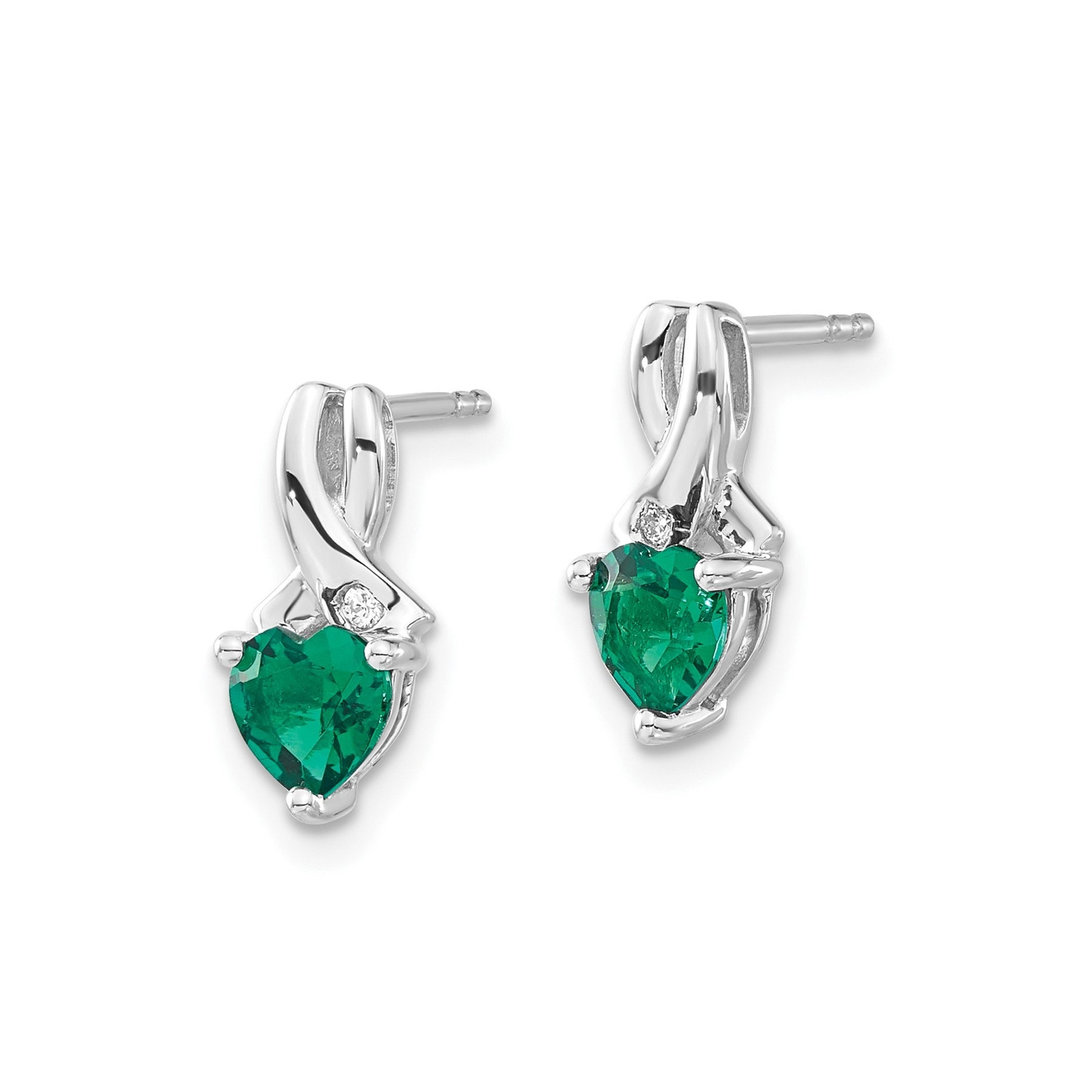 Heart-shaped green gemstone stud earrings with silver setting and small diamond accents
