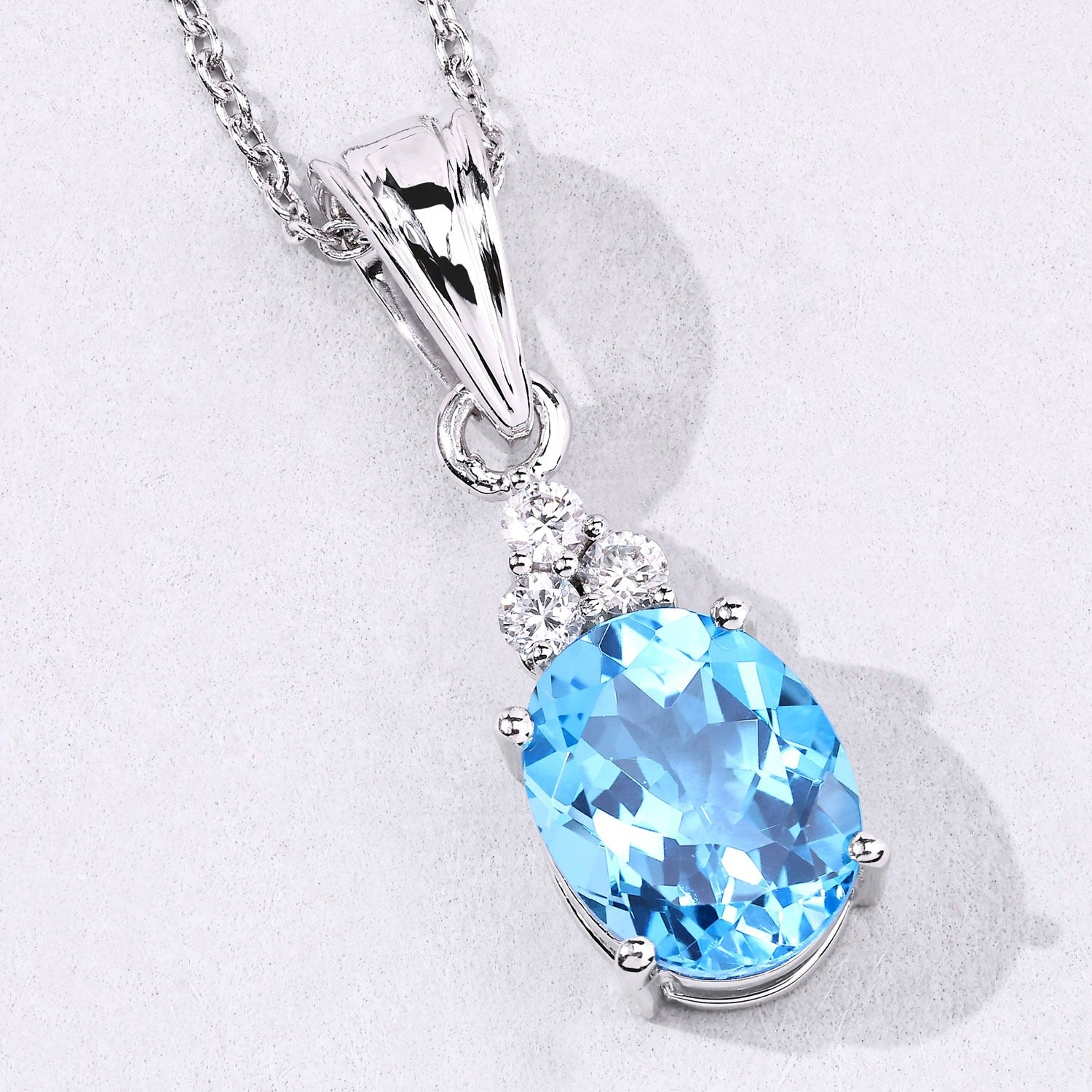 2.67 Ct Genuine Swiss Blue Topaz and Lab Diamond Silver Oval Necklace