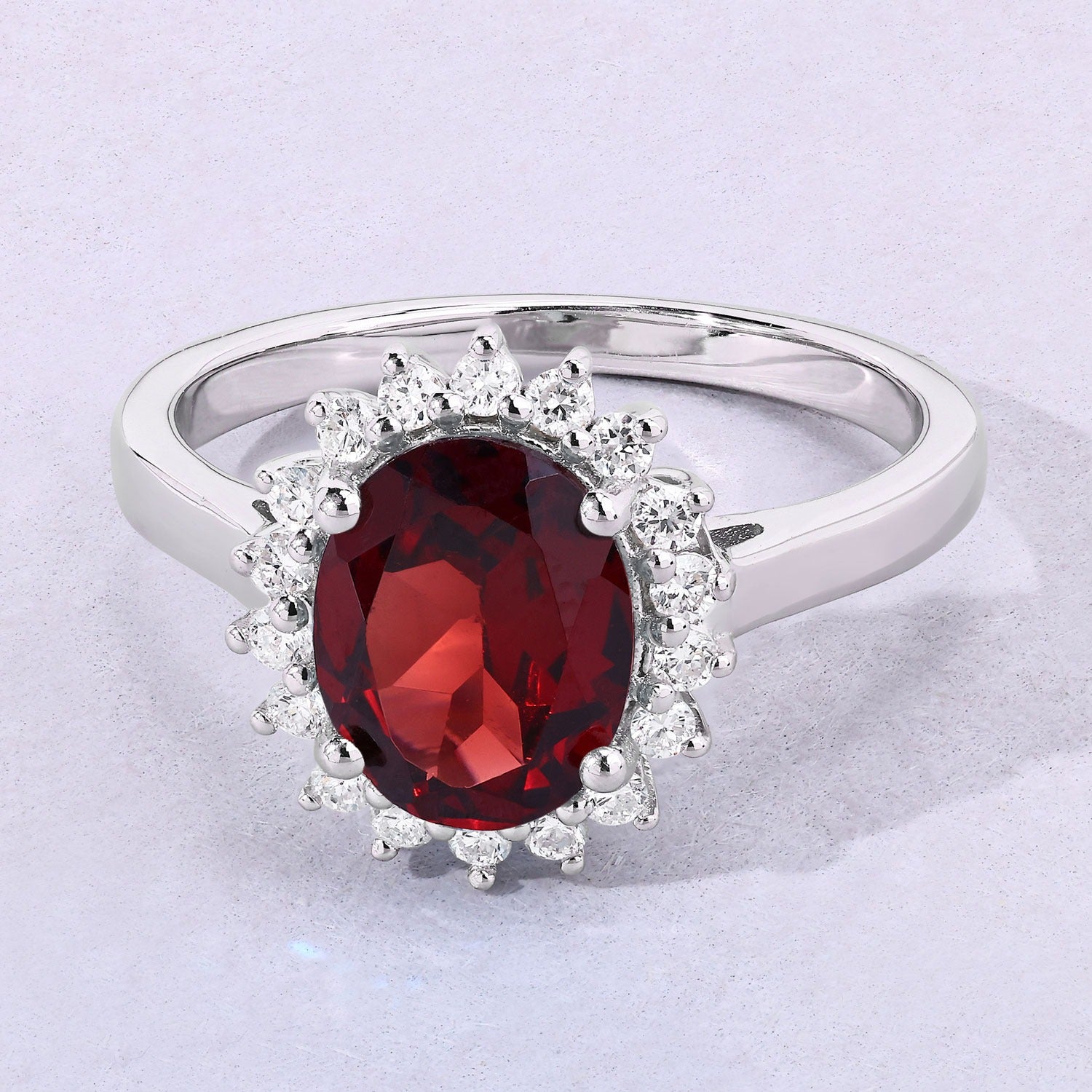 2 Ct Oval Red Mozambique Garnet and Lab Diamond Prong Silver Halo Ring