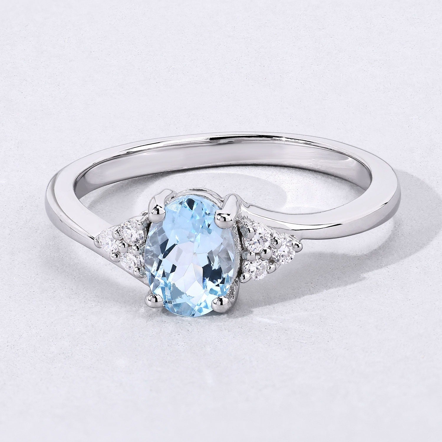 0.69 Ct Genuine Aquamarine and Lab Grown Diamond Sterling Silver Bypass Ring