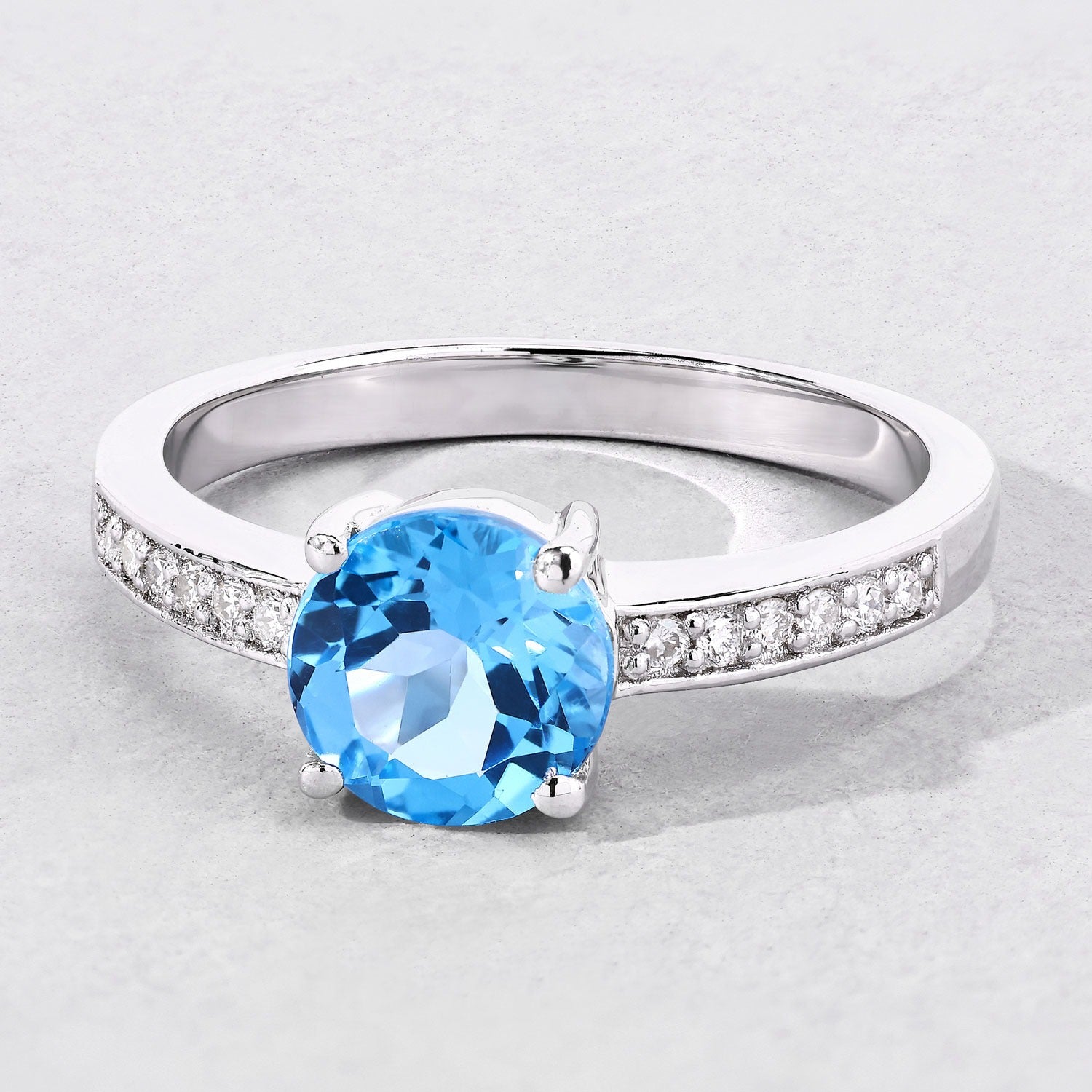 1.58 Ct Genuine Swiss Blue Topaz and Lab Diamond Silver Pave Ring