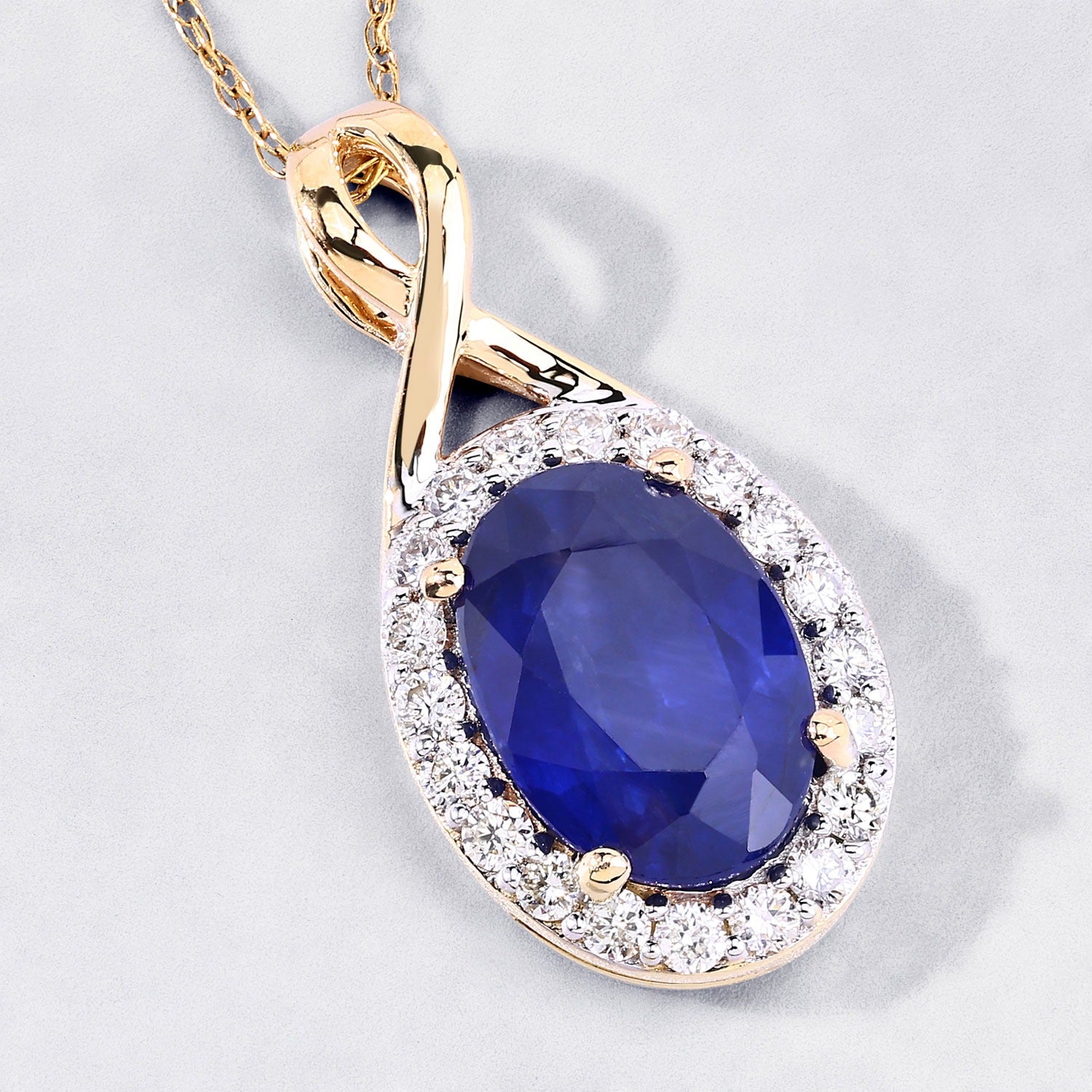 1.88 Ct Genuine Oval Ceylon Blue Sapphire and Diamond 18K Yellow Gold Crossover Pendant