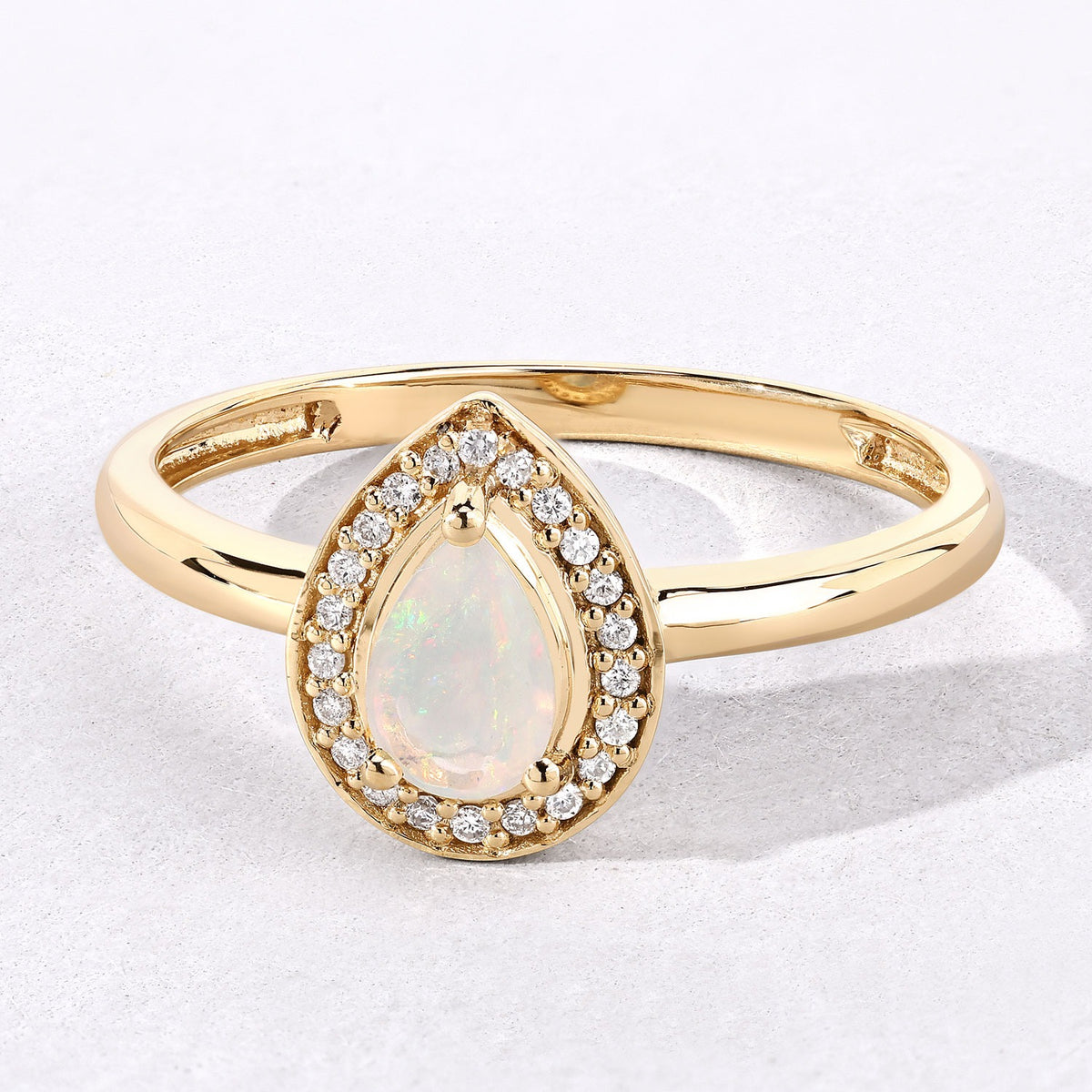 0.31 Cttw Pear White Ethiopian Opal White Diamond 14K Yellow Gold Halo Ring