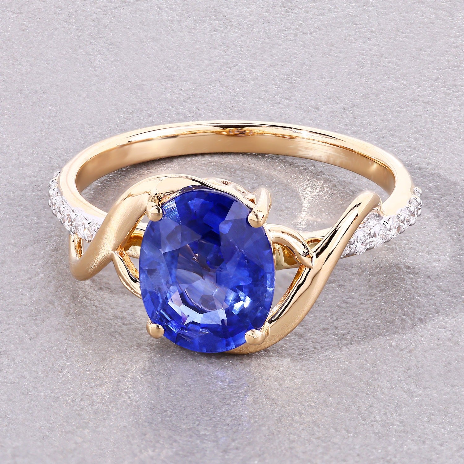 2.34 Ct Oval Ceylon Blue Sapphire and White Diamond Prong 18K Yellow Gold Pave Crossover Ring