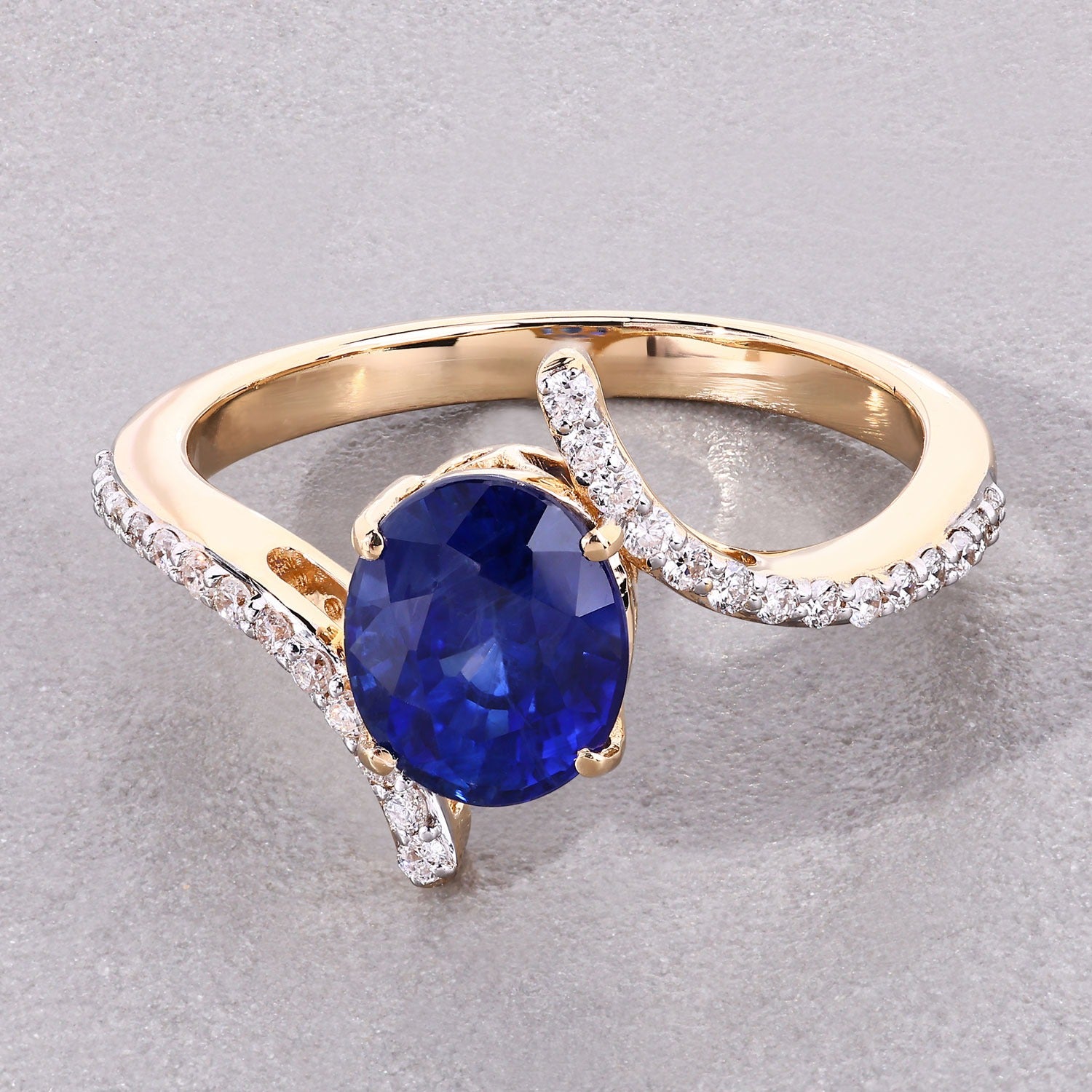 2.42 Ct Oval Ceylon Blue Sapphire and White Diamond Prong 18K Yellow Gold Pave Bypass Ring