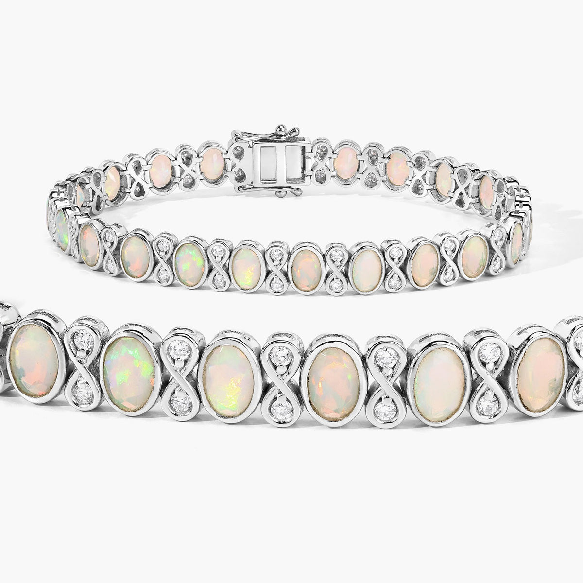6.25 Cttw Oval White Ethiopian Opal Lab Grown Diamond Sterling Silver Tennis Infinity Bracelet