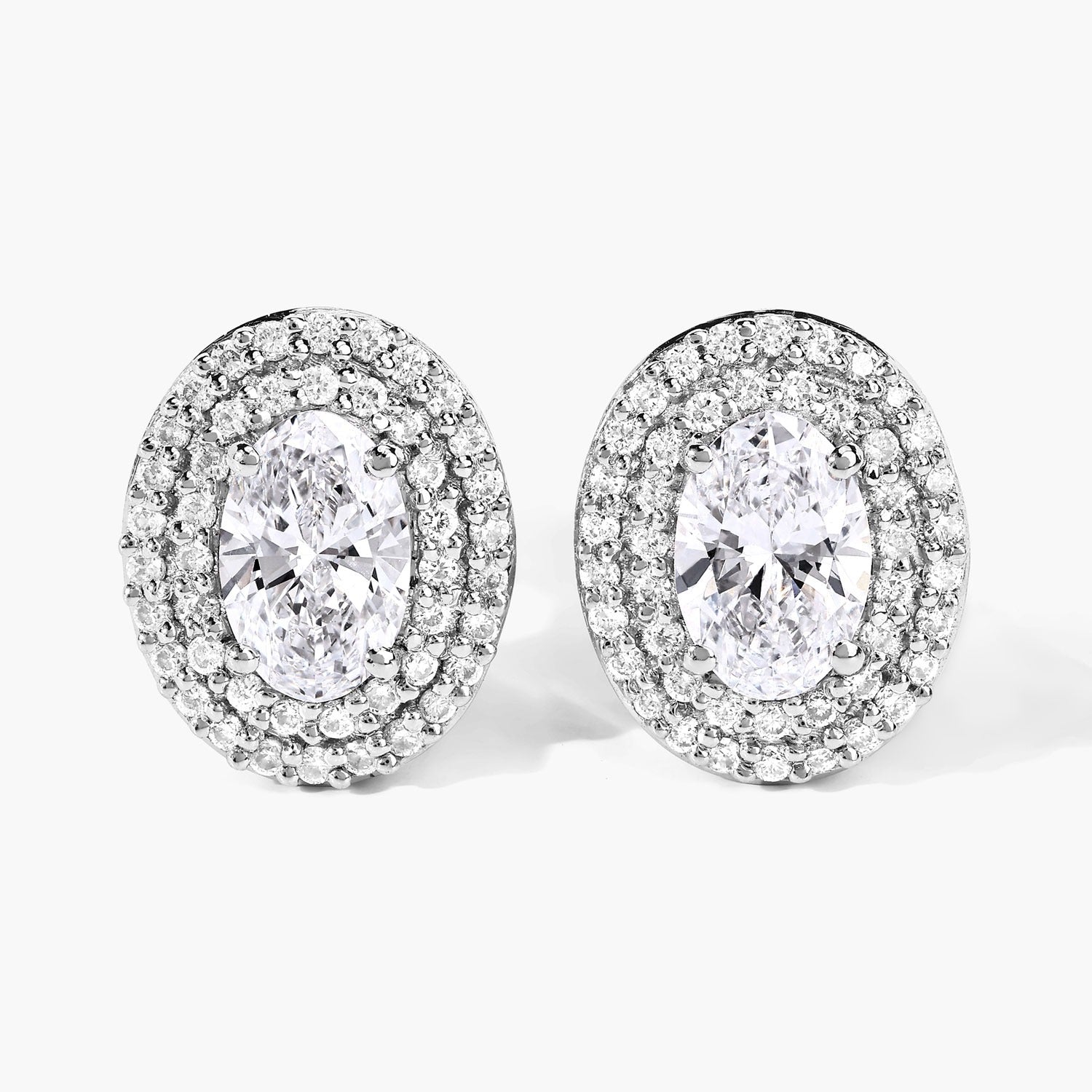 1.32 Ct. Oval Lab Grown Diamond Prong Platinum Double Bridal Halo Stud Earrings