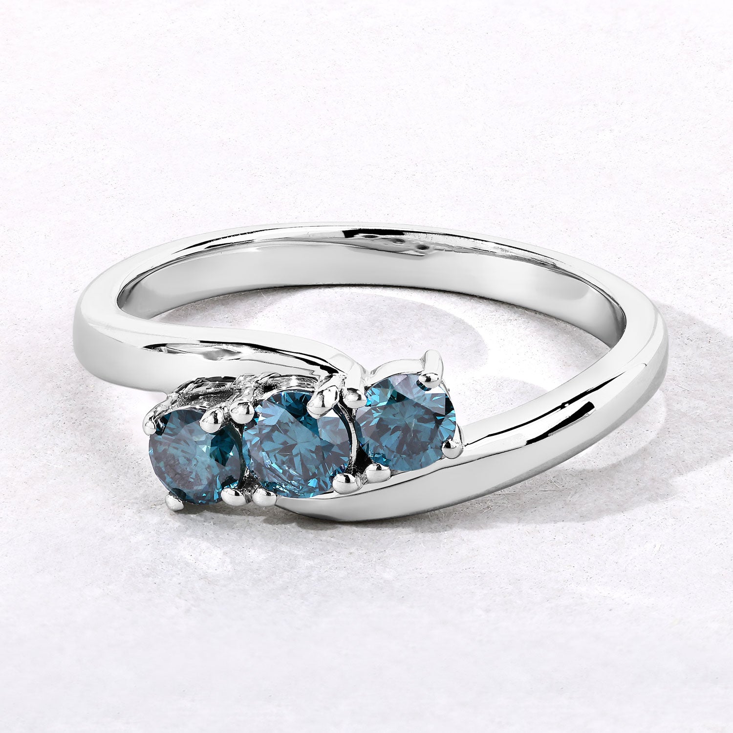 0.49 Cttw Round Teal Blue Diamond Rhodium Plated Silver Bypass 3-Stone Ring
