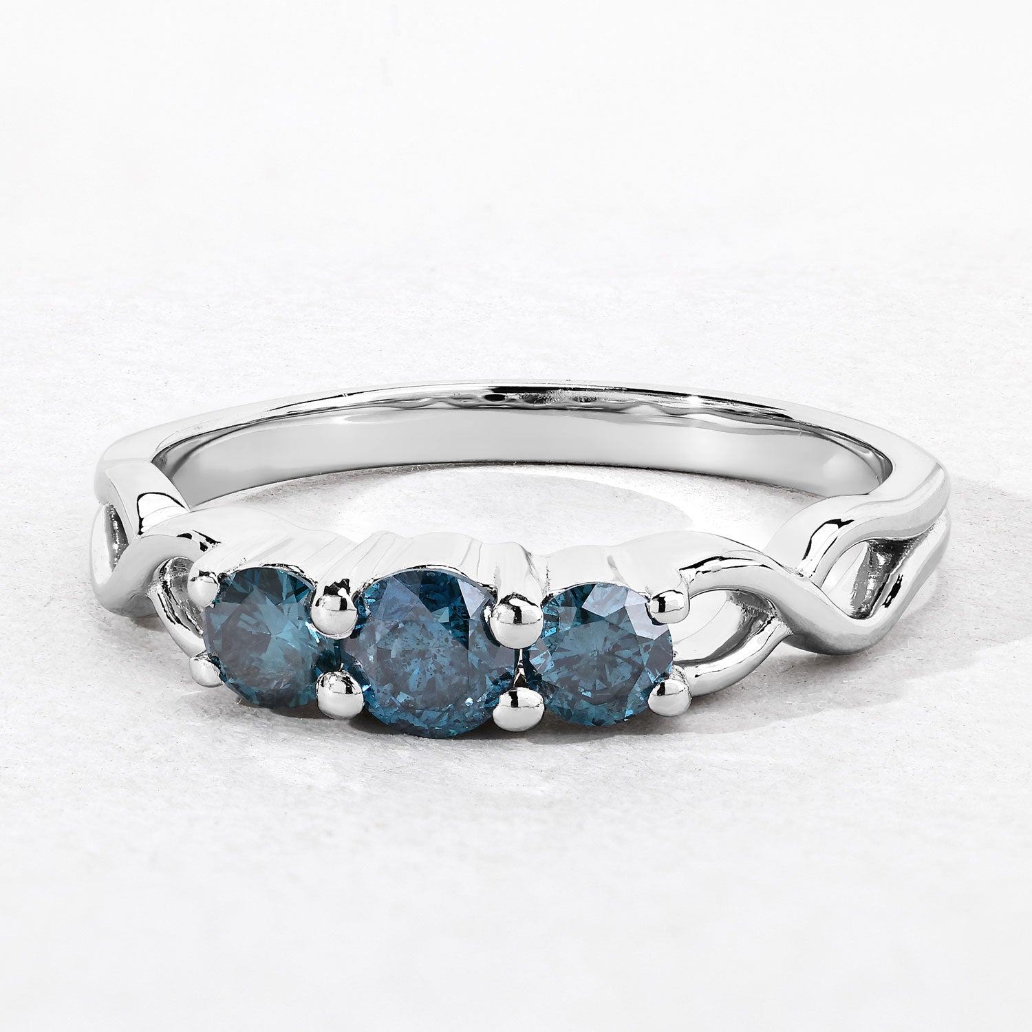 0.52 Cttw Round Teal Blue Diamond Rhodium Plated Silver Three Stone Twisted Band Ring