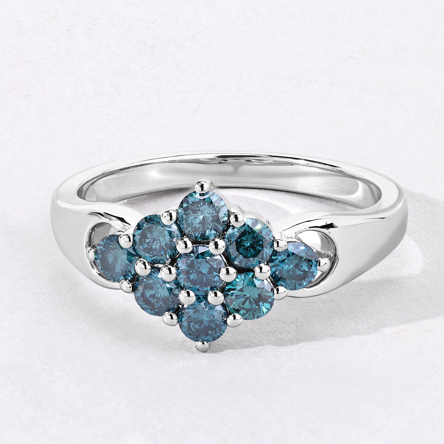 0.76 Cttw Round Teal Blue Diamond Rhodium Plated Silver Diagonal Cluster Ring
