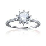 Bague solitaire en topaze blanche et fleur