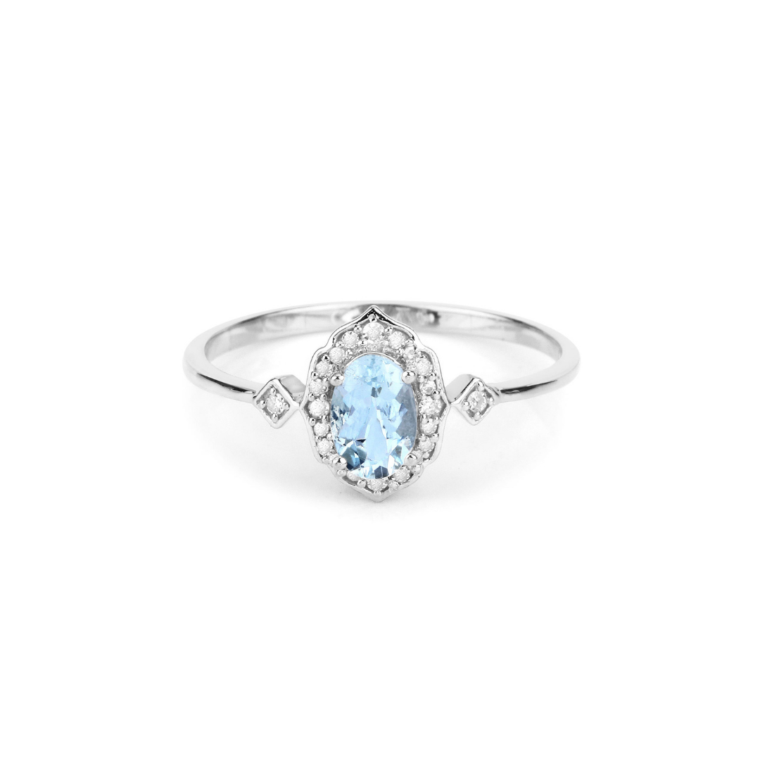 Blue oval Aquamarine Diamond Halo Ring