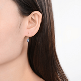 elegant earrings, model wearing hoop earrings, alexandrite earrings on woman, online earrings