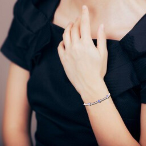 Elegant model hand showcasing the intricate details of our Adjustable Tanzanite Gemstone Beaded Bracelet Gift For Her