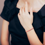 model wearing sapphire bracelet, september birthstone jewelry, adjustable bracelet for women, valentines gift ideas, jewelry gift for her