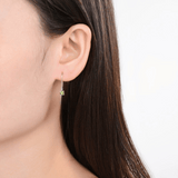 Natural Peridot Dainty Hoop Earrings model showcasing Peridot Minimalist Dangling Earrings 