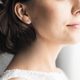 Model wearing blue Moissanite Minimalist Stud Earrings blue  Sterling Silver Earrings Minimalist Everyday Earrings for Women