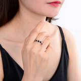 model wearing garnet ring, eternity ring design, elegant ring design, women ring designs