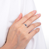 Model wearing sapphire ring, elegant blue sapphire ring, model in blue sapphire ring