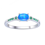 Blue Opal Oval Three Stone Ring, Lab grown oval cabochon opal ring, opal and emerald ring, affordable opal ring