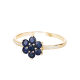 Anillo floral de zafiro azul y diamantes blancos en oro amarillo de 10 quilates