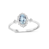 Blue oval Aquamarine Diamond Halo Ring