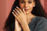 Model in opal ring, model in white opal ring