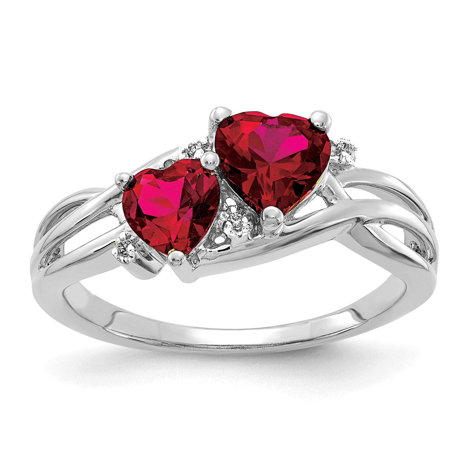 Silver ring with two heart-shaped red gemstones and small diamonds, fine jewelry.