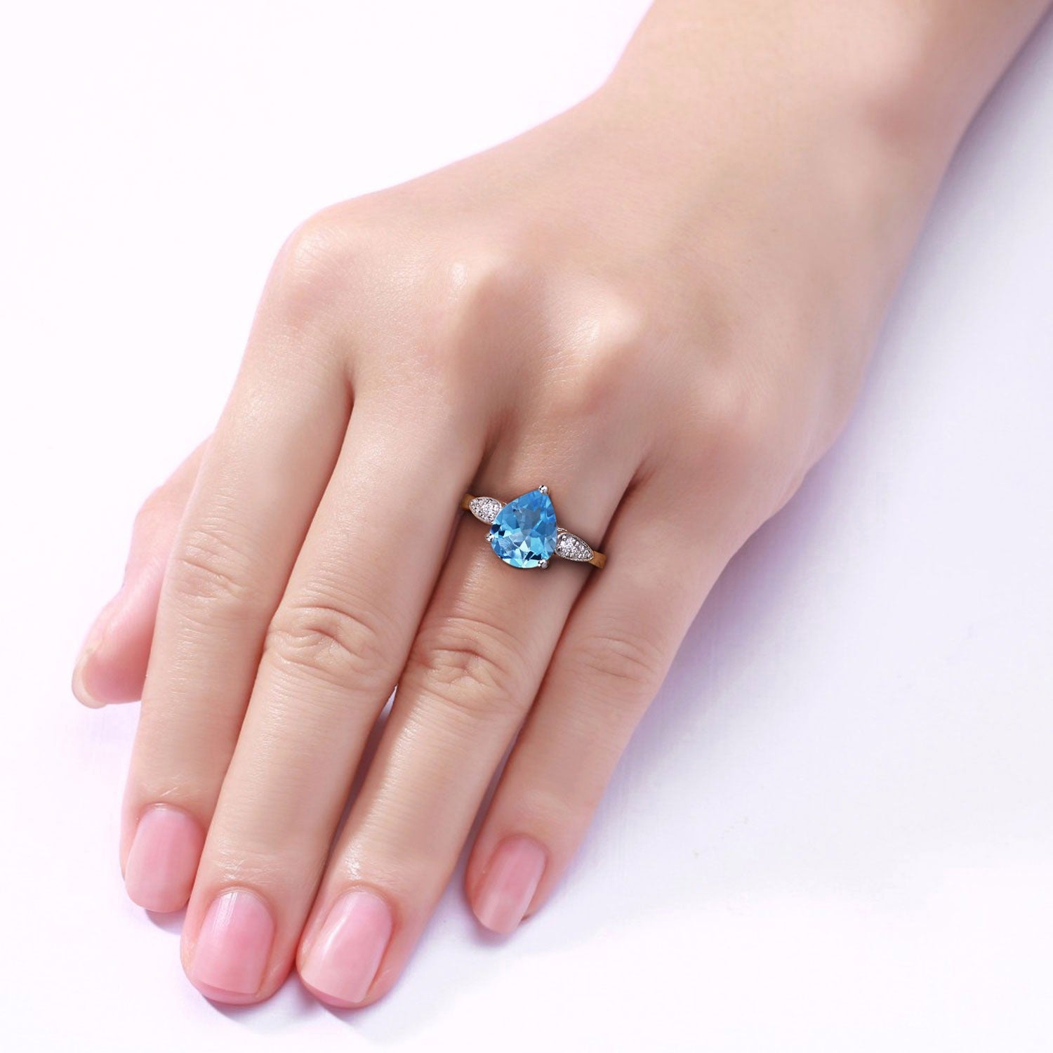 2.71 Ct Genuine Swiss Pear Shaped Blue Topaz and Lab Diamond Silver Bypass Ring