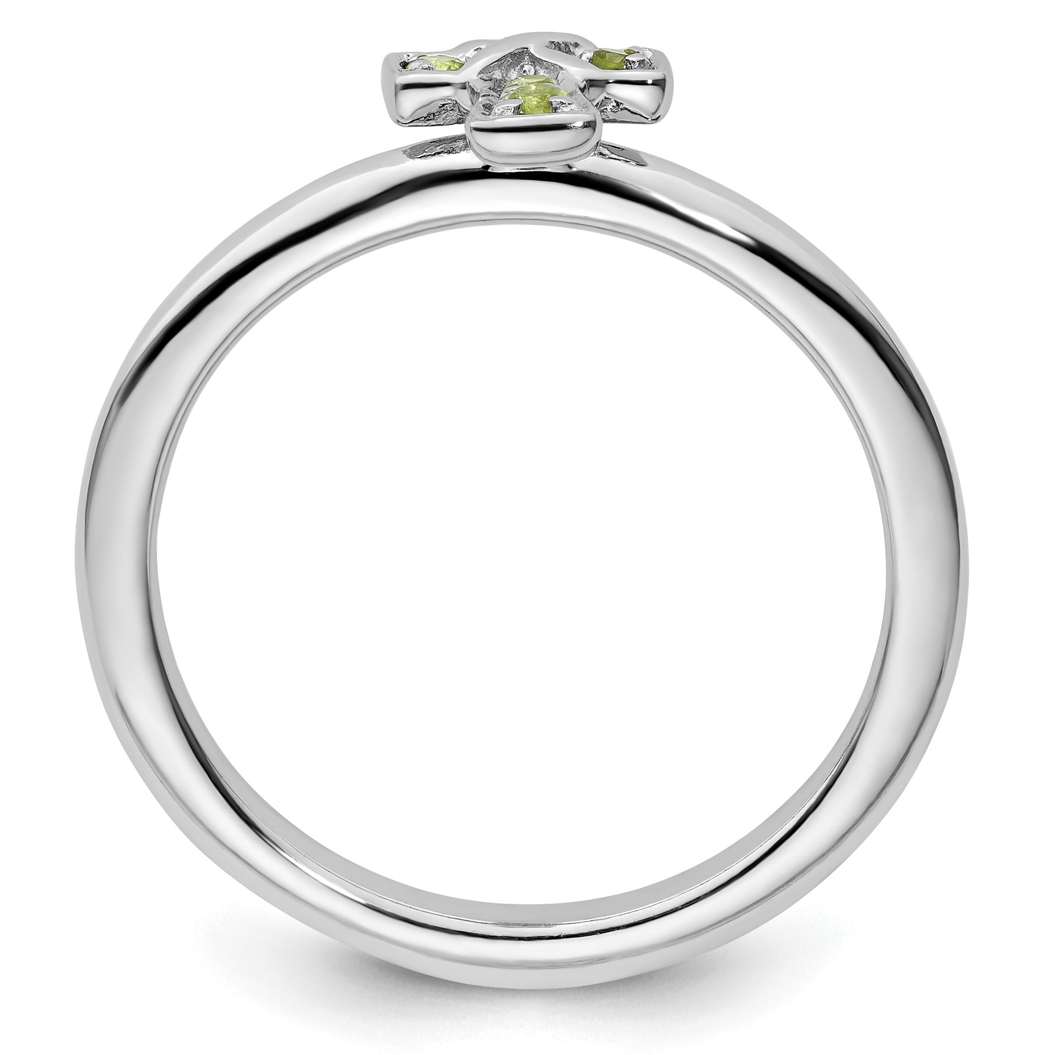 Silver ring with cross design featuring small yellow gemstones on top