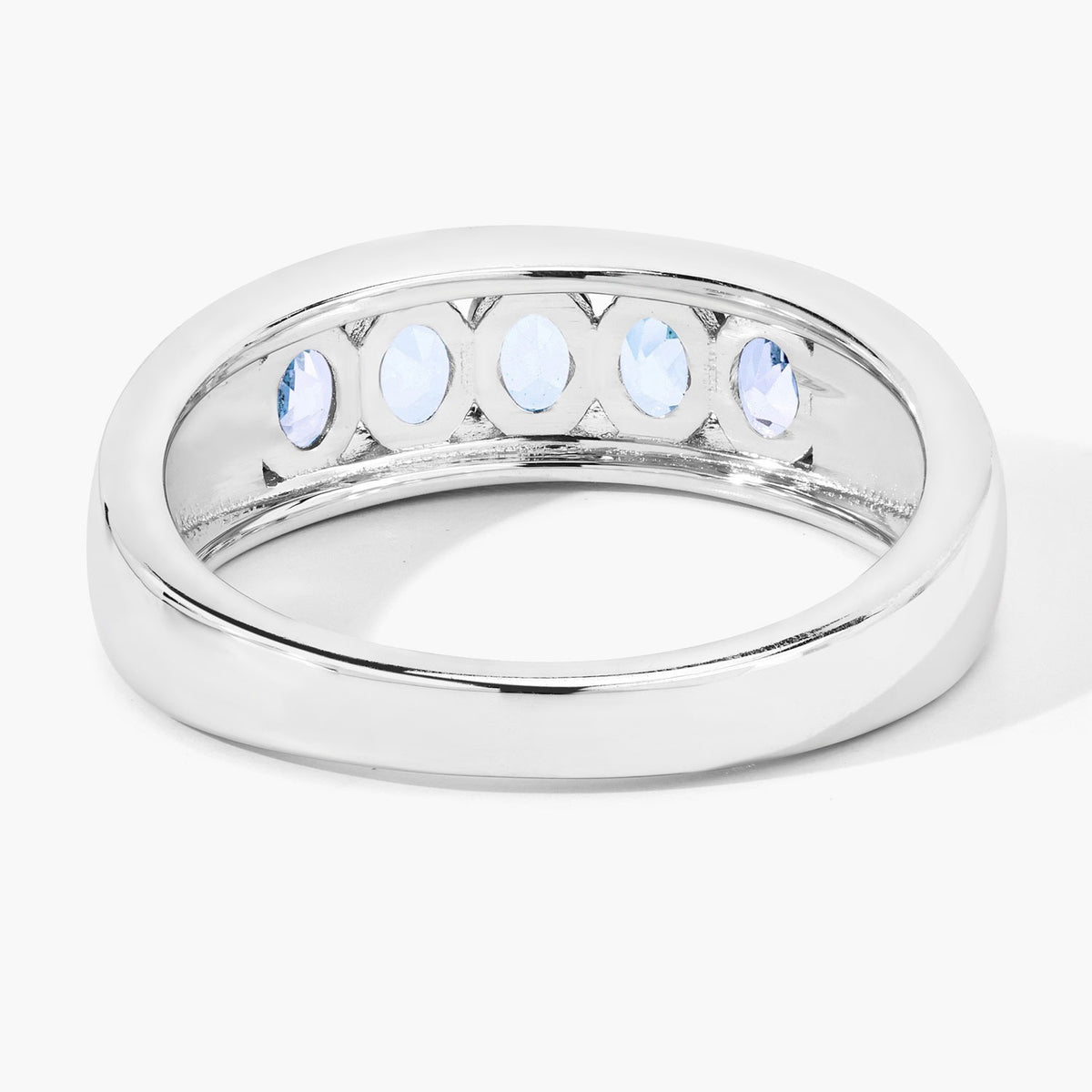 0.95 Cttw Oval Light Blue Topaz Channel Rhodium over Silver Five Stone Ring