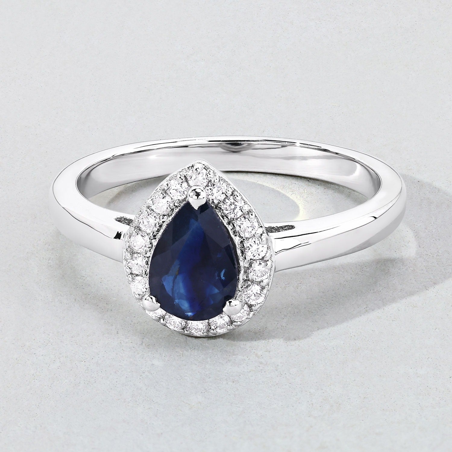0.94 Ct Genuine Pear Blue Sapphire and Lab Grown Diamond Silver Halo Ring