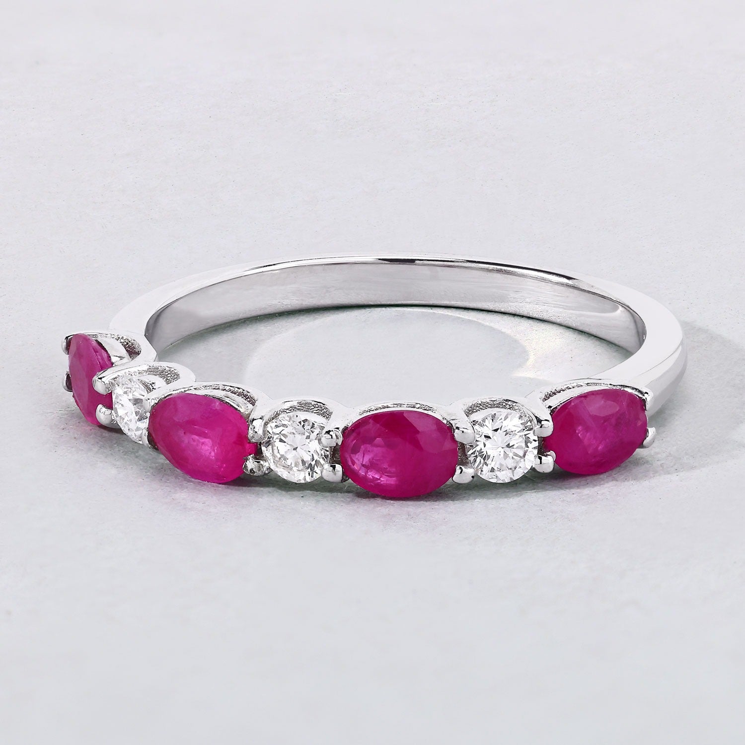 0.98 Ct Genuine Pink Oval Ruby and Lab Grown Diamond Eternity Silver Ring