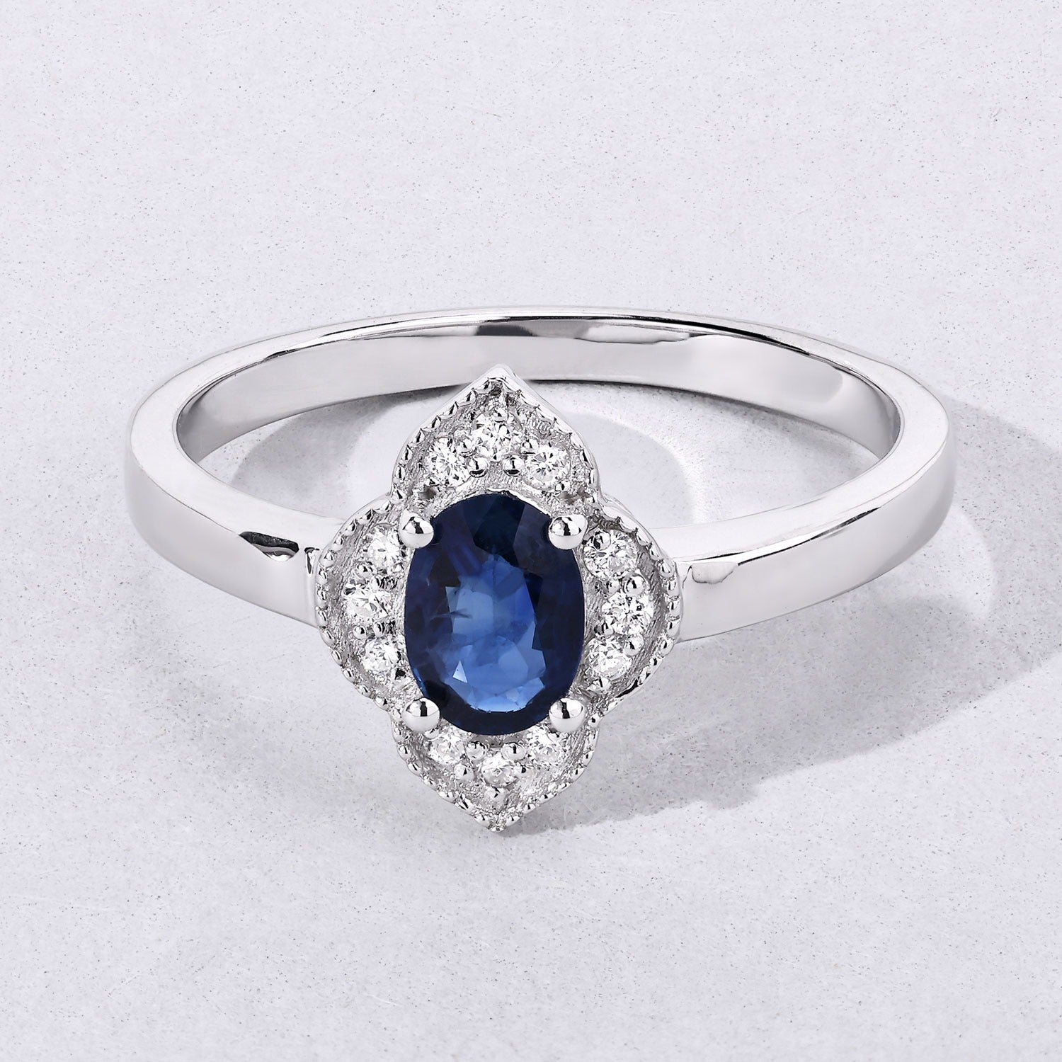 0.64 Ct Genuine Blue Sapphire and Lab Grown Diamond Halo Floral Ring