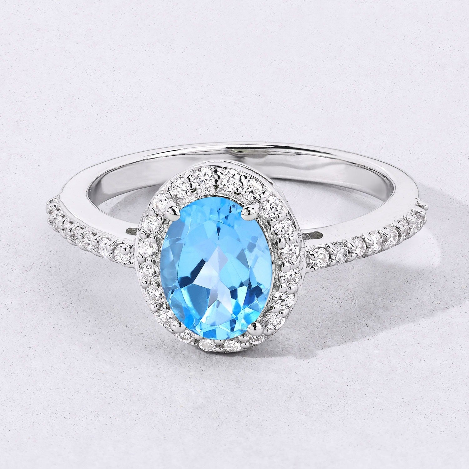 1.87 Ct Genuine Swiss Blue Topaz and Lab Diamond Silver Halo Ring