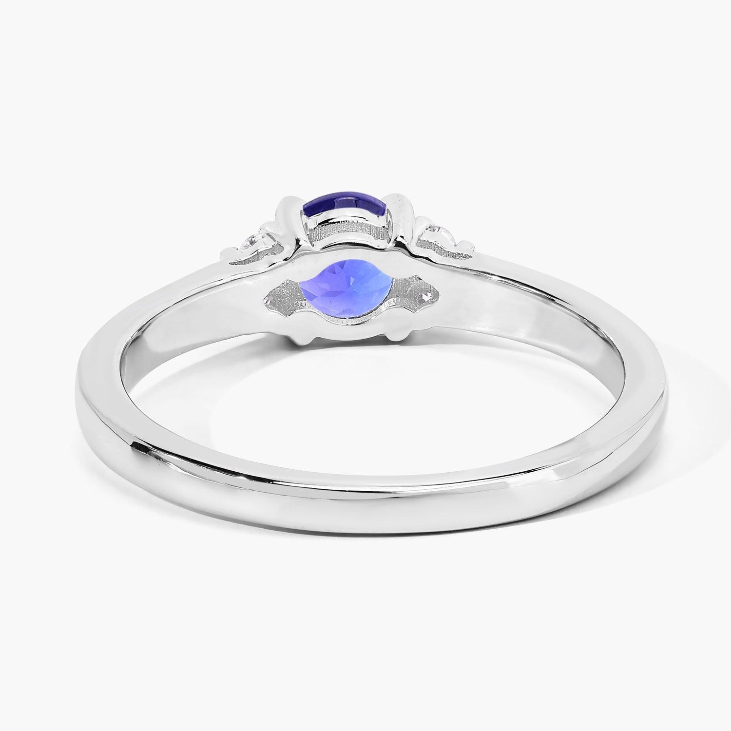 0.56 Ct Genuine Tanzanite and Lab Diamond Silver Round Ring