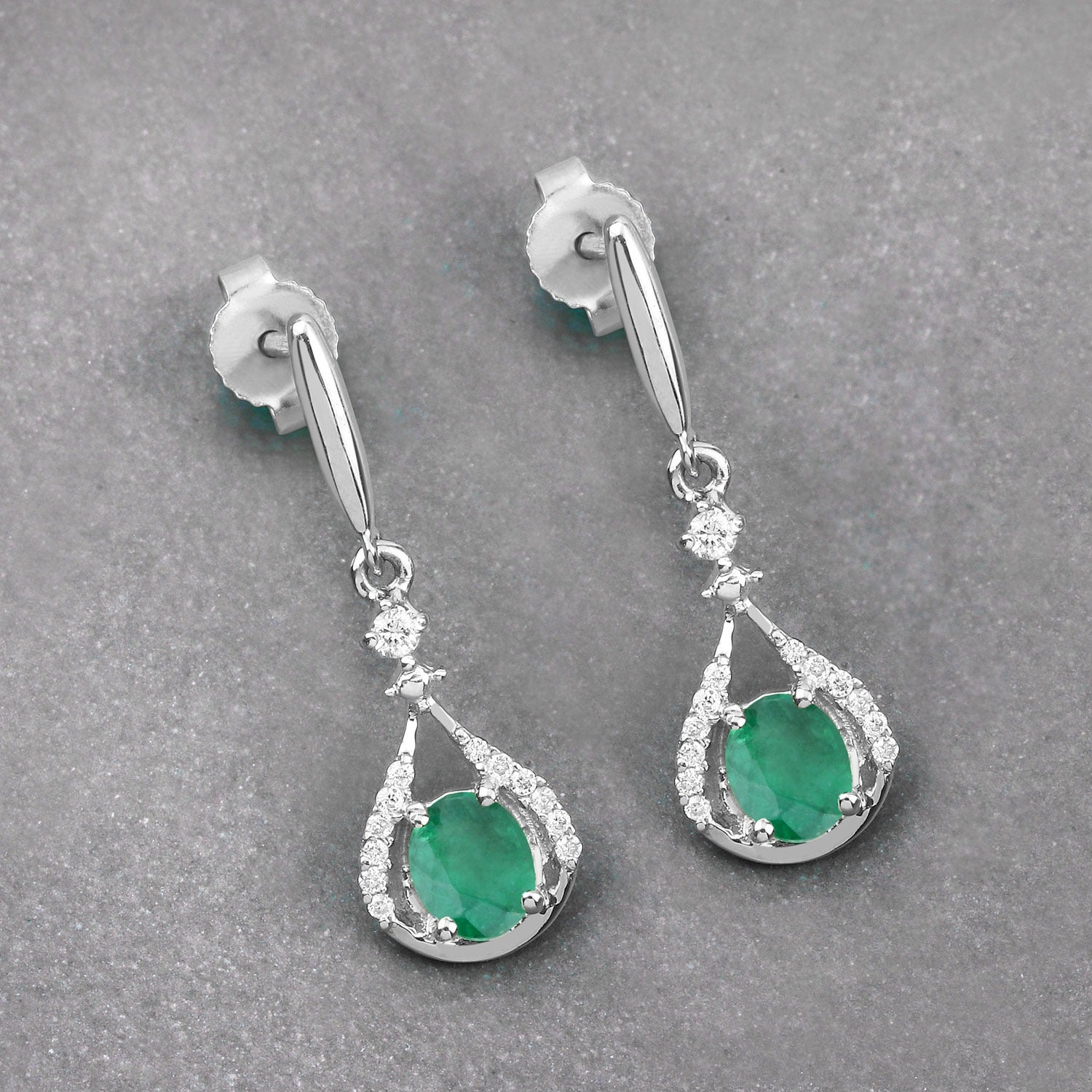 0.70 Ct Oval Green Zambian Emerald and Diamond 14K White Gold Dangle Drop Earrings