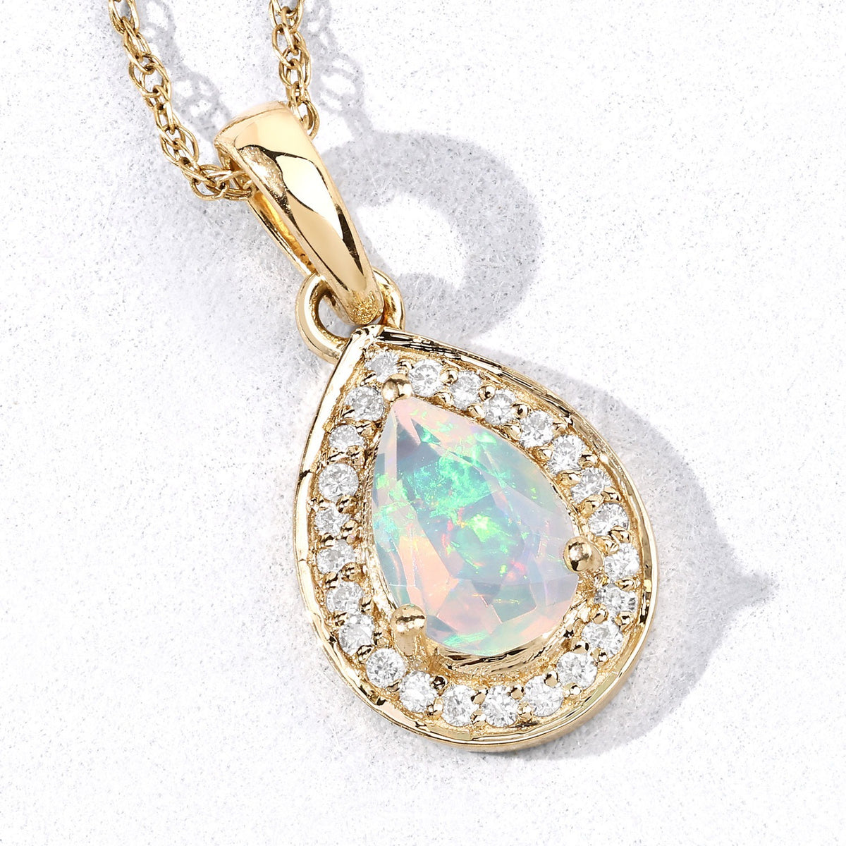 0.31 Cttw Pear White Ethiopian Opal White Diamond 14K Yellow Gold Teardrop Halo Pendant