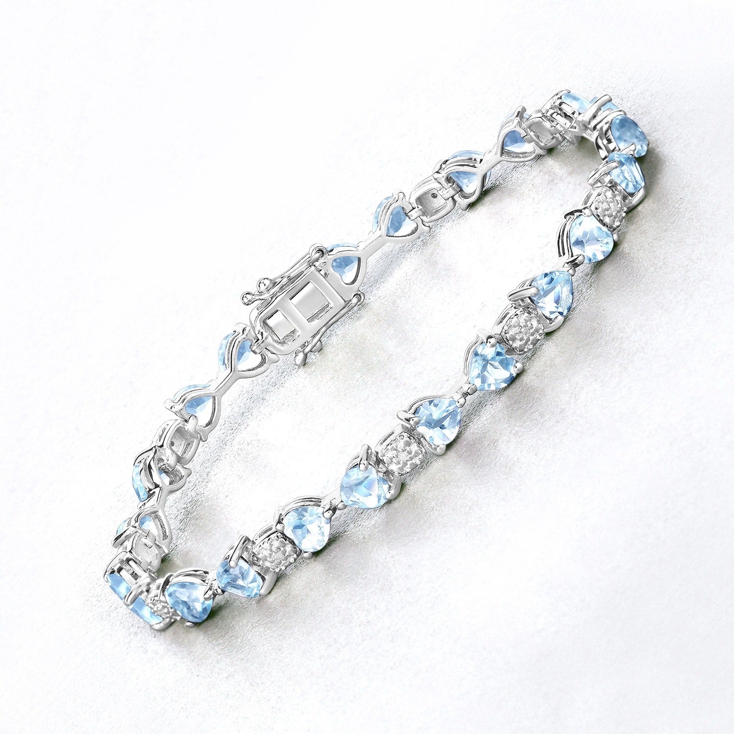 Elegant silver bracelet with blue gemstones and clear crystals from Fine Color Jewels collection