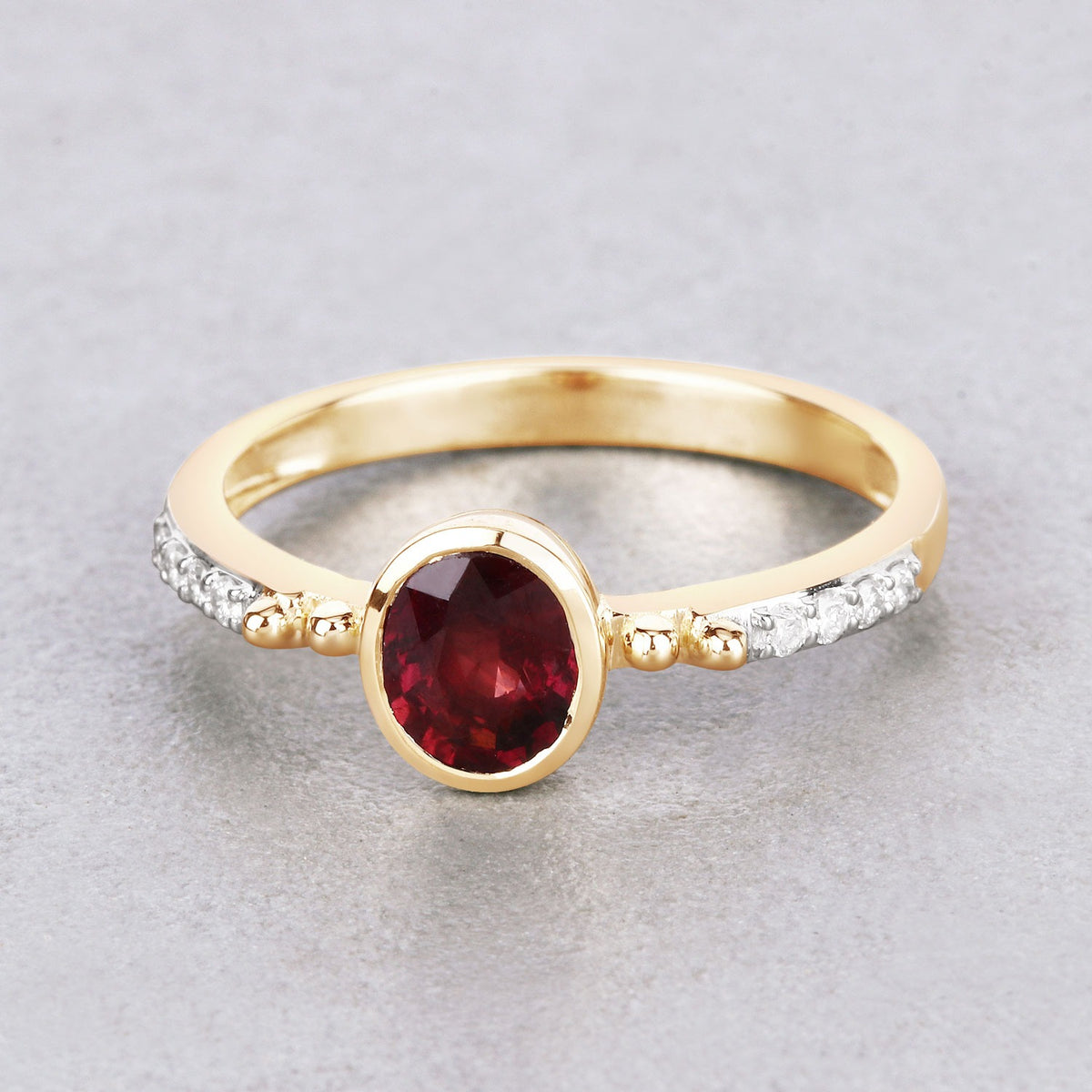1.00 Cttw Oval Red Ruby and Diamond Pave 14K Yellow Gold Bridge Ring