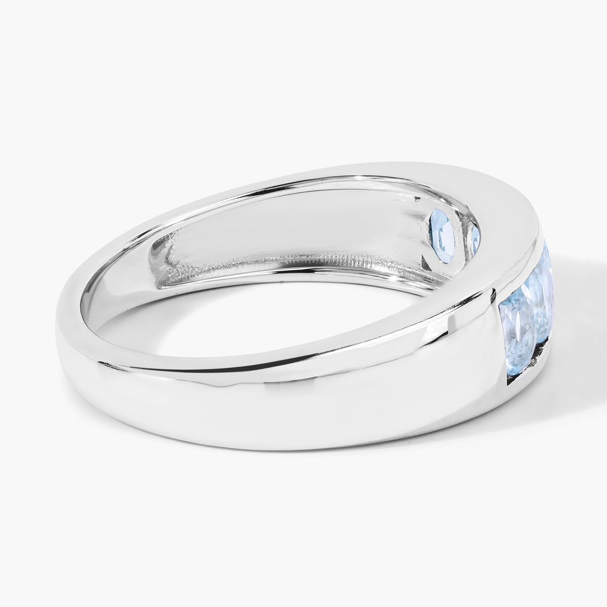 0.95 Cttw Oval Light Blue Topaz Channel Rhodium over Silver Five Stone Ring